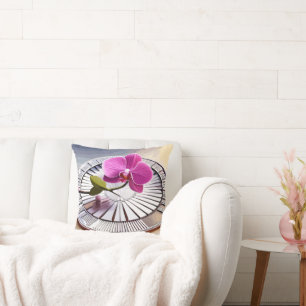 Exquisite Pink Orchid Rests on Silver Plate Cushion