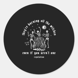 ey're burning all the witches halloween skelet classic round sticker