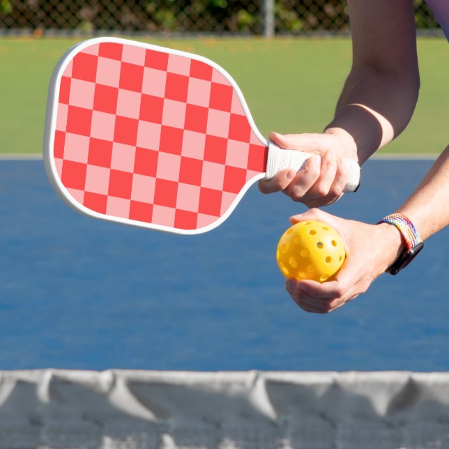 Eye-Catching Red and Pink Chequerboard Pickleball Paddle (Insitu)