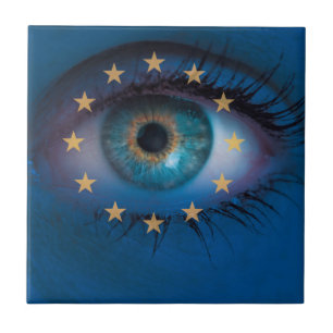 Eye looks through Europe flag background concept Tile