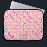 Eyeglasses Retro Modern Hipster Pink Gingham Name Laptop Sleeve<br><div class="desc">This colourful, nerdy eyeglass novelty design laptop sleeve has an original pattern made up of spectacles in a variety of shades and styles, all on a background of retro pink gingham. The cool, girly glasses' frames range from 50s and 60s cat eye / horn rimmed and browline shapes to round,...</div>