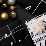 FA LA LA Black & White Chic Script Christmas Carol Wrapping Paper Sheet<br><div class="desc">Celebrate the magical and festive holiday season with our custom holiday wrapping paper sheets. Our modern black and white minimalistic holiday designs feature a bold typographic design "Fa La La" with a different script and san serif fonts to create this modern Christmas pattern wrapping paper. Two wrapping sheets featuring a...</div>