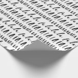 FA LA LA Black & White Typographic Christmas Carol Wrapping Paper<br><div class="desc">Celebrate the magical and festive holiday season with our custom holiday wrapping paper. Our modern black and white minimalistic holiday design features a bold typographic design "Fa La La" with different script and san serif fonts to create this modern Christmas pattern wrapping paper. (Background colour can be changed to suite...</div>
