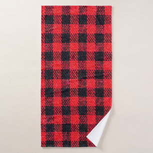Fabric texture with grid pattern, red squares and bath towel