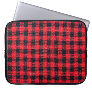 Fabric texture with grid pattern, red squares and laptop sleeve