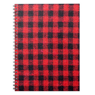 Fabric texture with grid pattern, red squares and notebook