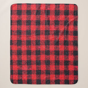 Fabric texture with grid pattern, red squares and sherpa blanket