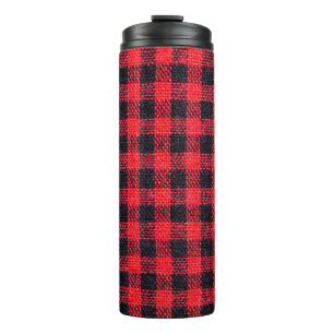 Fabric texture with grid pattern, red squares and  thermal tumbler