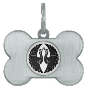 Facing white cranes pet tag