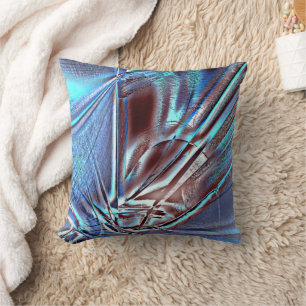 Faded blue hue over brown with jagged strokes cushion