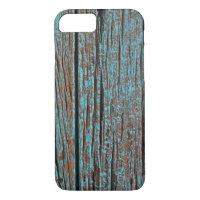 faded turquoise paint on rustic wood