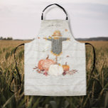 Fall Pumpkins Grandma Garden Scarecrow Rustic Wood Apron<br><div class="desc">Watercolor artwork of a trio of fall pumpkins, burgundy flowers, autumn leaves and a scarecrow standing guard with his friends the butterflies. A rustic distressed soft white and grey painted wood barn board background is paired with your personalised name or message. Art painted by internationally licensed artist and designer, Audrey...</div>