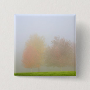 Fall trees shrouded in mist 15 cm square badge