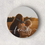 Family Calligraphy Photo Large Clock<br><div class="desc">Crafted with precision and care,  our personalised clock boasts a sleek and sophisticated design. The clock face is adorned with a beautifully handwritten script,  where the word “Family” takes centre stage. This handwritten script imparts a sense of personal touch and warmth,  emphasizing the importance of family bonds.</div>