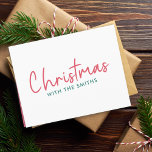 Family Christmas | Modern Minimalist Family Name Holiday Card<br><div class="desc">Simple,  stylish "Christmas with the <your name="">" quote folded holiday cards in modern minimalist typography in festive red and green. The design can be easily personalized with your family name(s),  year or own special greeting for super cute bespoke holiday vibes!</your></div>