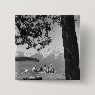 Family having picnic by lake mountains 15 cm square badge