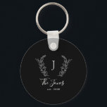 Family monogram name elegant personalised black key ring<br><div class="desc">Custom family classic laurels monogram with established year elegant chic black and white keychain.         A chic keepsake gift for weddings,  newlyweds,  anniversaries,  housewarmings,  new home,  Thanksgiving,  Christmas,  or any other occasion.</div>
