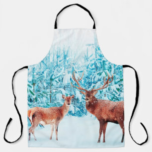 Family of noble deer in a snowy winter. Christmas Apron