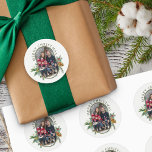 Family Photo Holly and Pine Merry Christmas Classic Round Sticker<br><div class="desc">Merry Christmas stickers with photo and traditional bouquets of holly, pine and pine cone. The colours of the text and background can be changed in the design tool. Your photo is displayed in 16:9 portrait format and the photo template will automatically display them in a pill-shaped, rounded lozenge shape. Please...</div>