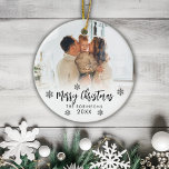 Family Photo Merry Christmas Script Snowflakes  Ceramic Ornament<br><div class="desc">Elegant Modern Black White Hand Lettered Script "Merry Christmas" Family Photo Ornament. Features a family photo, a Merry Christmas text which is written in handwritten calligraphy script, snowflakes and year on photo overlay (in black and white). Easy to personalise it. Photo tip: crop your photo to square form before upload...</div>