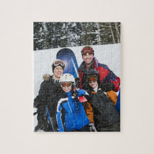 Family portrait with snowboards jigsaw puzzle