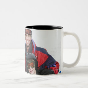 Family portrait with snowboards Two-Tone coffee mug