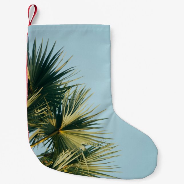 Fan palm tree under blue sky small christmas stocking (Front)
