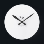 Fancy Script Calligraphy Minimalist Wall Round Clock<br><div class="desc">This fancy script calligraphy minimalist wall round clock is the perfect gift to present to the bride-to-be for a simple wedding shower. The design features a beautiful calligraphy in a white background.</div>