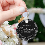 Fancy Silver on Black Bridesmaid Wedding Key Ring<br><div class="desc">These beautiful bridesmaid keychains are designed to be given as a gift or wedding favor. The design is simple yet elegant and features a frilly silver gray border with pale gray text on a black background. There is space for her name, the wedding date and the names of the couple....</div>