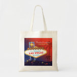 Fancy Twilight Las Vegas Wedding Bridesmaids Gift Tote Bag<br><div class="desc">Fabulous Las Vegas sign and lovely palm tree silhouettes glittering stars red & inky blue background illustrated on custom Bridesmaids Gift Bags. Create super gorgeous and unique gifts for your special bridesmaids by customising the bag one by one! ((You can find the matching wedding essentials & favours in this store,...</div>