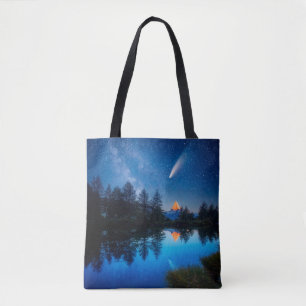Fantastic starry sky over the Matterhorn spire. Lo Tote Bag