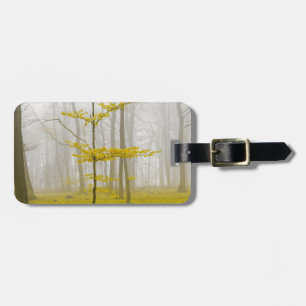 Fantasy forest with fog and yellow leaves luggage tag