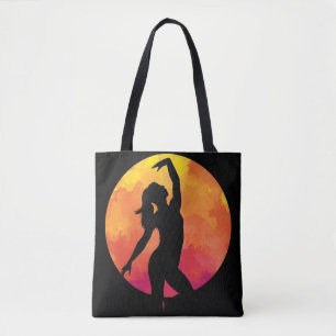 Fantasy of a girl dancing ballet at night under th tote bag