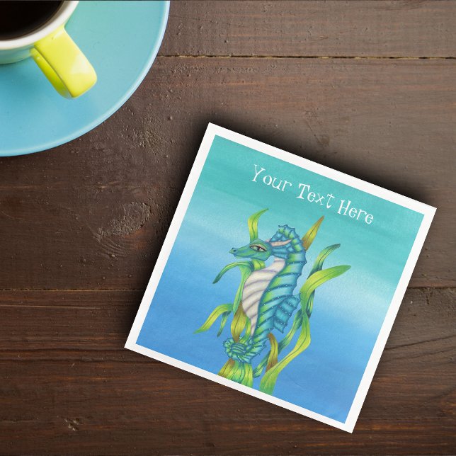 Fantasy Sea Dragon Aqua Blue in Seaweed on blues Napkin (Fantasy sea dragon in aqua blue with horns green seaweed on blue paper party napkin.)