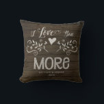 Farmhouse Rustic Wood I Love You More Typography Cushion<br><div class="desc">"Farmhouse Rustic Wood I Love You More Typography Throw Pillow." There is an option to include your names and date (or erase the text in the template if you prefer it unpersonalized). Hand painted rustic reclaimed wooden barn board background with sketched typography design with heart flowers, foliage and scrolls. Art...</div>