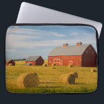 Farms | Red Barns Near Hay Bales Laptop Sleeve<br><div class="desc">This amazing Getty Images photo features three red barns near hay bales.</div>