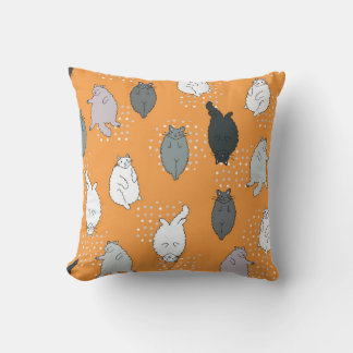 Fat, fluffy cats are lying on their backs. Cute co Cushion