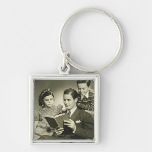 Father Reading to Son Key Ring