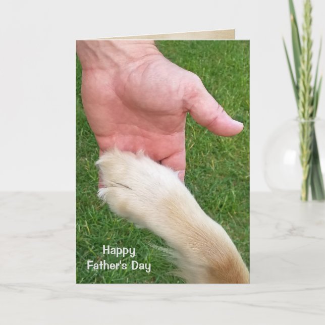 Father's Day dog paw in man's hand Card (Front)