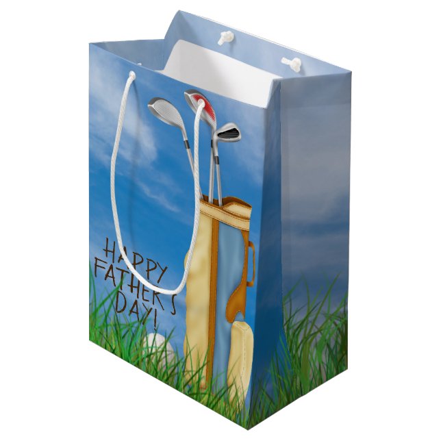 Father's Day-golf bag and clubs with ball in grass (Front Angled)