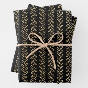 Faux gold and black pattern wrapping paper sheet