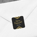Faux Gold Chevron We're Engaged Engagement Square Sticker<br><div class="desc">This elegant square sticker features a chic geometric chevron and the word "We're Engaged" in faux gold against a black background. It's great for an engagement celebration. Check out matching invitations and items here http://www.zazzle.com/collections/modern_faux_gold_chevron_celebration_collection-119531050277382712?rf=238364477188679314 Personalise it with your details by replacing the placeholder text. For more options click the "Customise...</div>