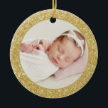 Faux Gold Glitter Baby's First Christmas Photo Ceramic Ornament<br><div class="desc">Add sparkle and shine to your Christmas tree with this festive custom baby's first Christmas photo ornament. It features faux gold glitter with classic typography. Personalise by adding photos, holiday greeting, year and family signature. Feature your favourite baby photo with this glitter Christmas photo ornament. This holiday baby photo ornament...</div>