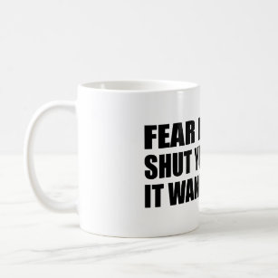 Fear doesnt shut you down it wakes you up coffee mug
