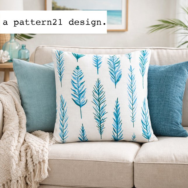 feather and fern blues pattern cushion (Watercolor fern pillow adds fresh blue botanical pattern to relaxed coastal interiors)