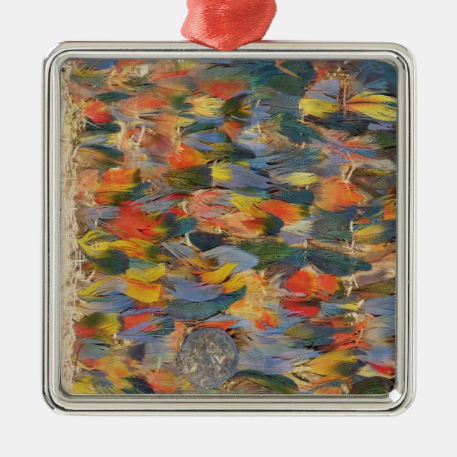 Feathered cape metal ornament (Front)