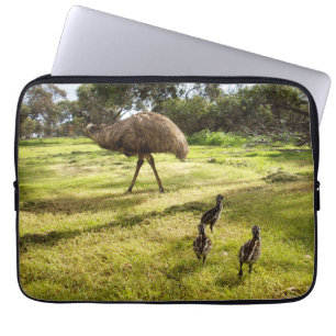 Feathers and Footsteps: A Father Emu With Chicks Laptop Sleeve