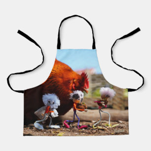 Feeding Fubby the chicken with walnut shells full Apron