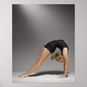 Female gymnast stretching, studio shot 2 poster