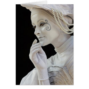 Female mime performing on street corner